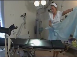 Terrific sykepleier i tan strømper og hæler i sykehus - dorcel